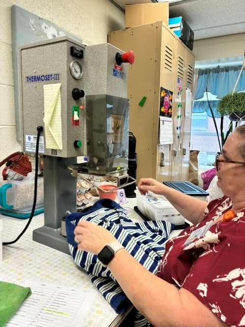 Denise Weaver works as seamstress