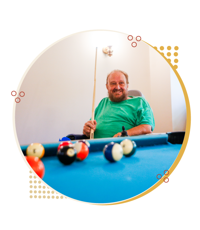 Resident playing billiards