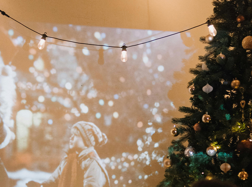 christmas movie projection with tree in corner