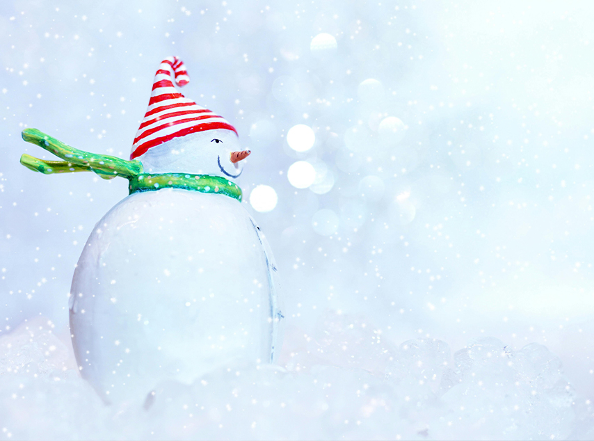 snowman with red hat and green scarf