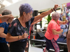 Women staying active during exercise class